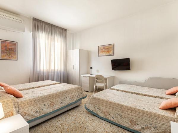 Hotel Minerva : photo 5 de la chambre chambre quadruple standard