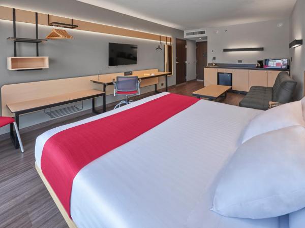 City Express by Marriott Monterrey Lindavista : photo 1 de la chambre chambre lit queen-size supérieure avec canapé-lit