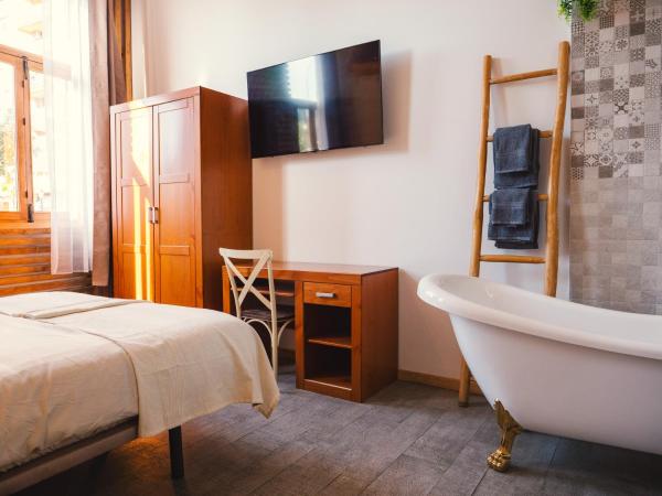 Banana Beach Patacona Rooms : photo 6 de la chambre chambre double deluxe avec baignoire