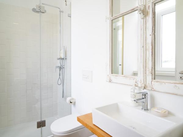 CoimbraAmeias : photo 10 de la chambre chambre double ou lits jumeaux