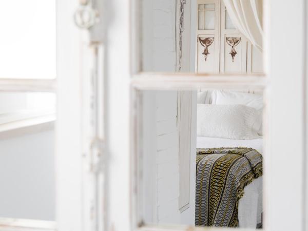 CoimbraAmeias : photo 7 de la chambre suite queen avec vue sur la ville