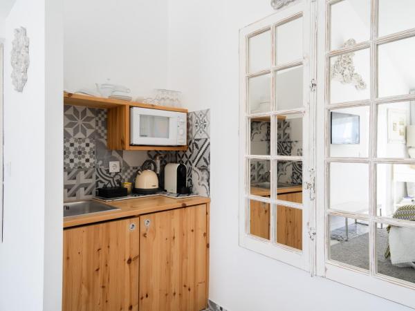 CoimbraAmeias : photo 9 de la chambre suite queen avec vue sur la ville