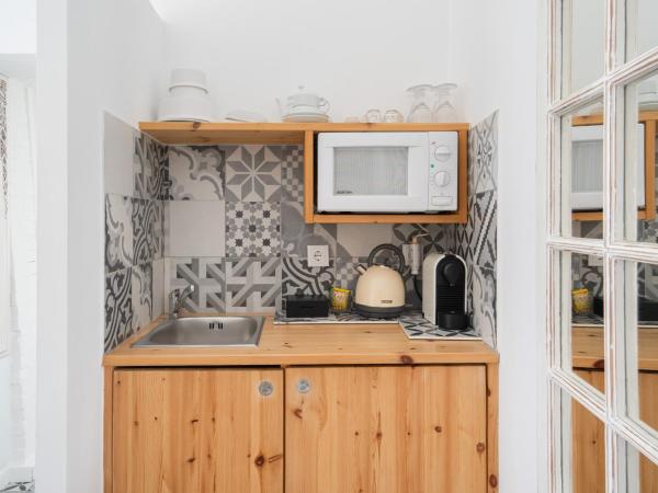 CoimbraAmeias : photo 10 de la chambre suite queen avec vue sur la ville