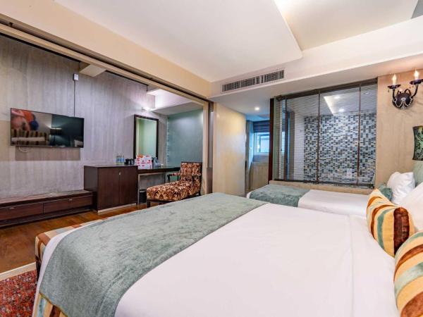 Sunbeam Hotel Pattaya - SHA Extra Plus : photo 3 de la chambre chambre quadruple de luxe