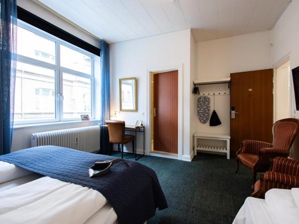 Milling Hotel Ansgar : photo 4 de la chambre chambre double ou lits jumeaux avec lit d'appoint