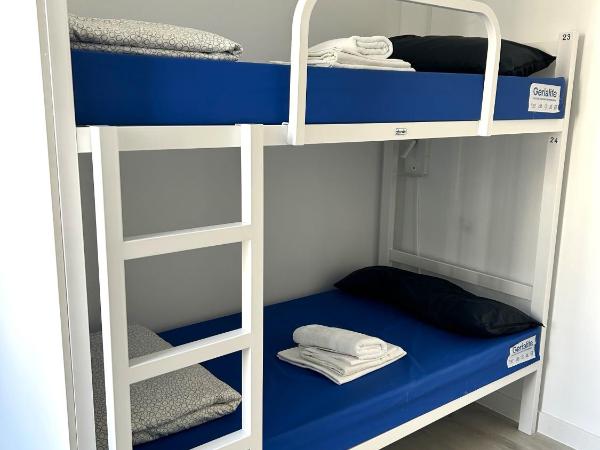 Albergue SCQ : photo 3 de la chambre lit dans dortoir mixte de 4 lits