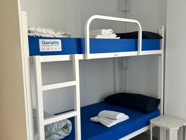 Albergue SCQ : photo 2 de la chambre lit dans dortoir mixte de 4 lits
