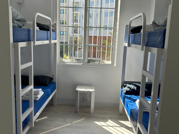Albergue SCQ : photo 1 de la chambre lit dans dortoir mixte de 8 lits 