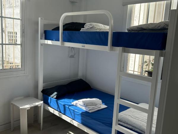 Albergue SCQ : photo 9 de la chambre lit dans dortoir mixte de 8 lits 