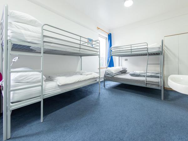 Pax Lodge : photo 1 de la chambre chambre familiale avec salle de bains commune