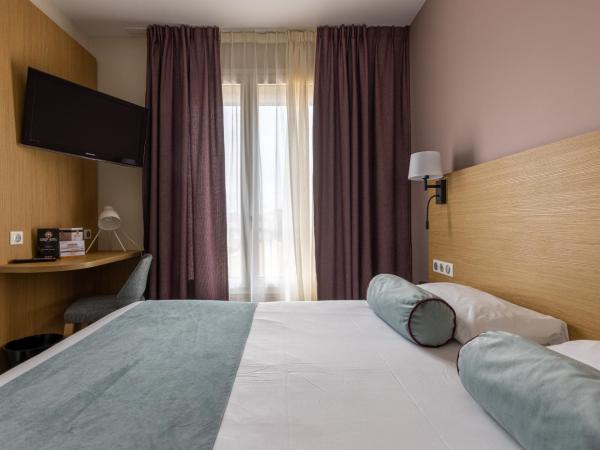 Brit Hotel Europ Bergerac : photo 1 de la chambre chambre double standard