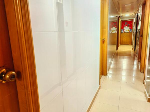 景士迪宾馆 : photo 3 de la chambre chambre simple avec toilettes et douche communes