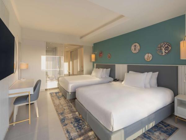 Hilton Skanes Monastir Beach Resort : photo 6 de la chambre suite 1 chambre avec 2 lits queen-size