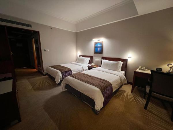 Baolong Hotel Shanghai : photo 3 de la chambre chambre lits jumeaux supérieure