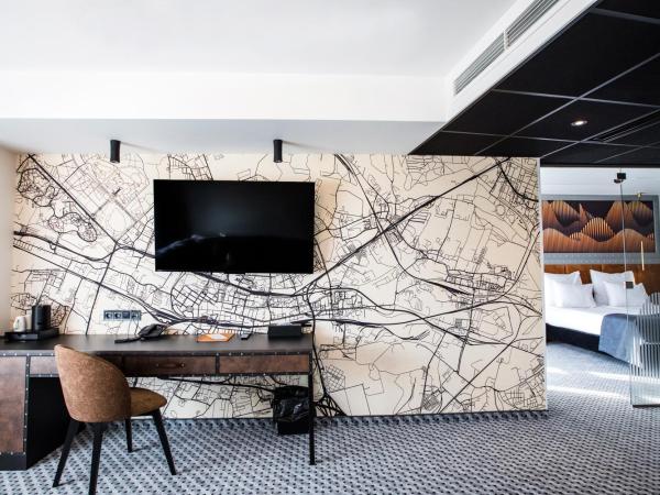 Hotel M23 Mariacka Katowice Centrum : photo 2 de la chambre appartement