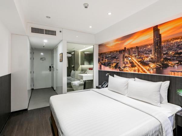 Galleria 12 Sukhumvit Bangkok by Compass Hospitality : photo 1 de la chambre chambre allongée