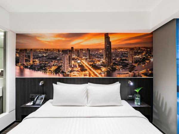 Galleria 12 Sukhumvit Bangkok by Compass Hospitality : photo 2 de la chambre chambre allongée