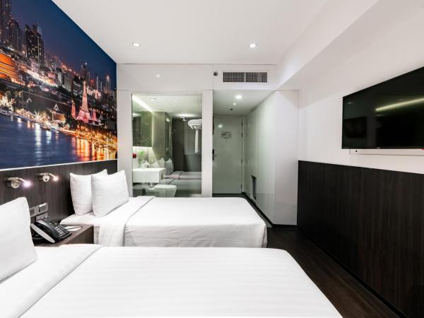 Galleria 12 Sukhumvit Bangkok by Compass Hospitality : photo 4 de la chambre chambre allongée