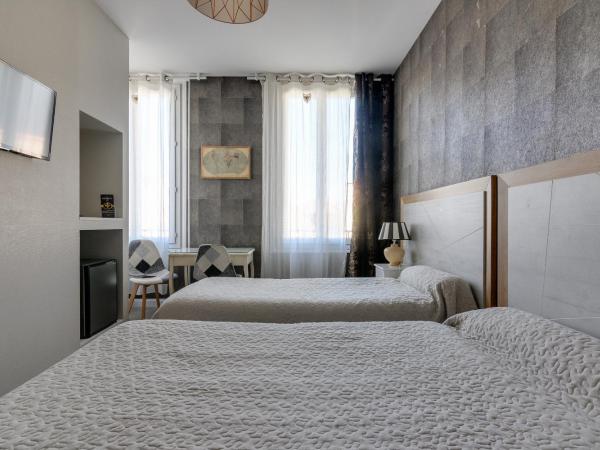 Hôtel Henri IV : photo 6 de la chambre chambre lits jumeaux