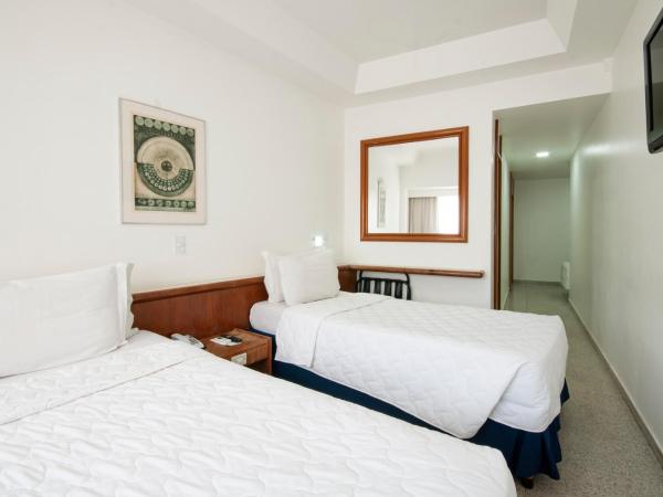 Hotel Bandeirantes : photo 2 de la chambre chambre triple standard