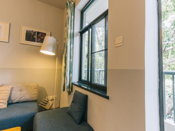 Shenzhen Loft Youth Hostel : photo 2 de la chambre appartement 1 chambre avec balcon