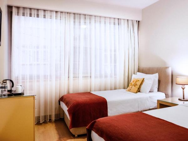 Cheya Beşiktaş Istanbul Bosphorus City Center Hotel & Suites : photo 4 de la chambre chambre quadruple confort