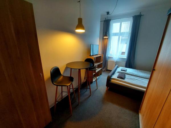 METRO Pokoje & Apartamenty : photo 2 de la chambre petite chambre double