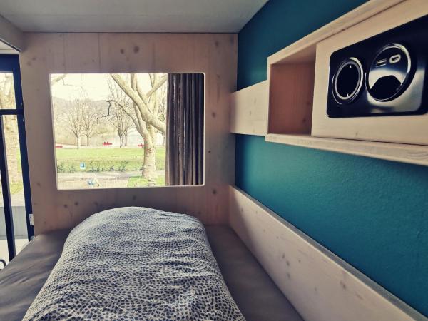 Backpackers Luzern : photo 5 de la chambre lit simple dans un dortoir pour femmes de 4 lits avec salle de bains commune