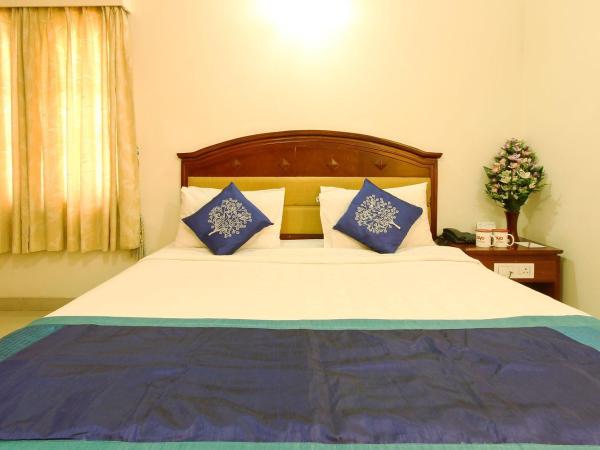 OYO Chevron Orchards Near Snow City : photo 4 de la chambre chambre triple deluxe