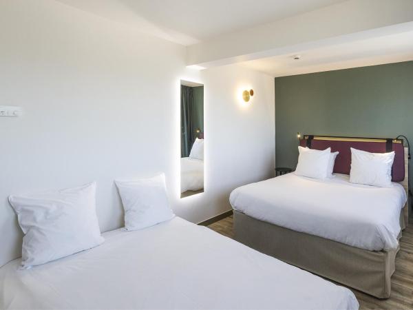 Campanile Perpignan Aéroport : photo 2 de la chambre chambre avec 1 lit double et 1 canapé-lit double