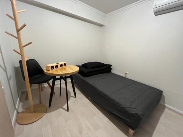 Green house room 101 : photo 1 de la chambre chambre simple avec toilettes communes