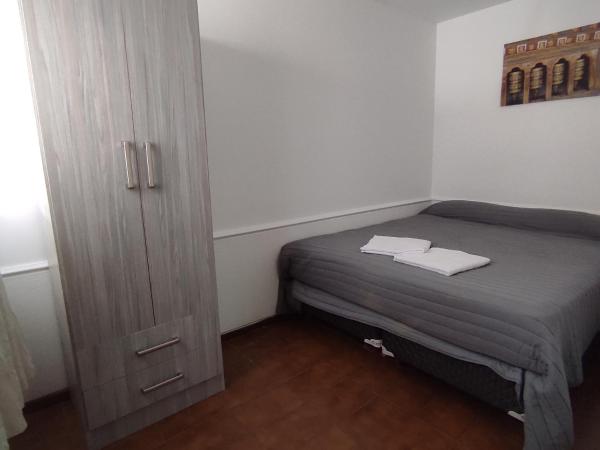 Tanino Home Suites : photo 1 de la chambre petite chambre double ou lits jumeaux