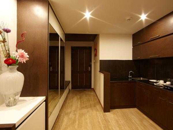 Golden Fruits Business Suites : photo 1 de la chambre chambre deluxe