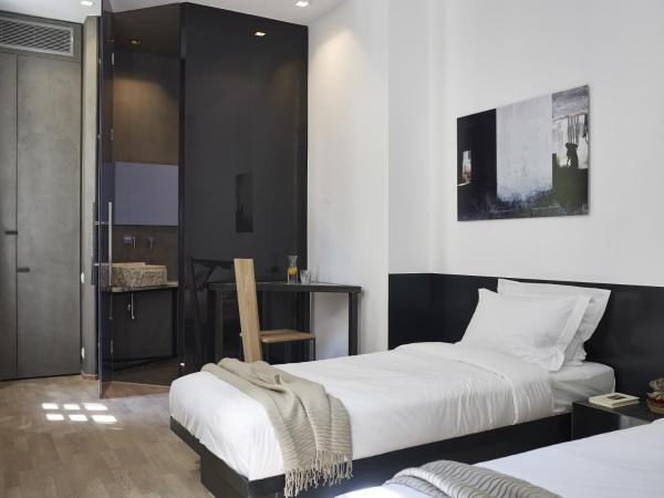 InnAthens : photo 2 de la chambre chambre double ou lits jumeaux de luxe - vue sur atrium
