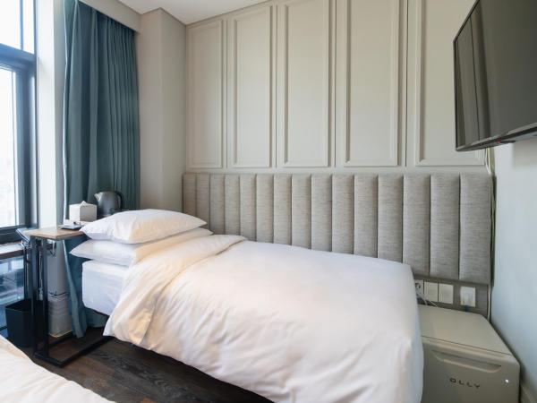 Hotel Crescendo Seoul : photo 3 de la chambre petit hébergement lits jumeaux
