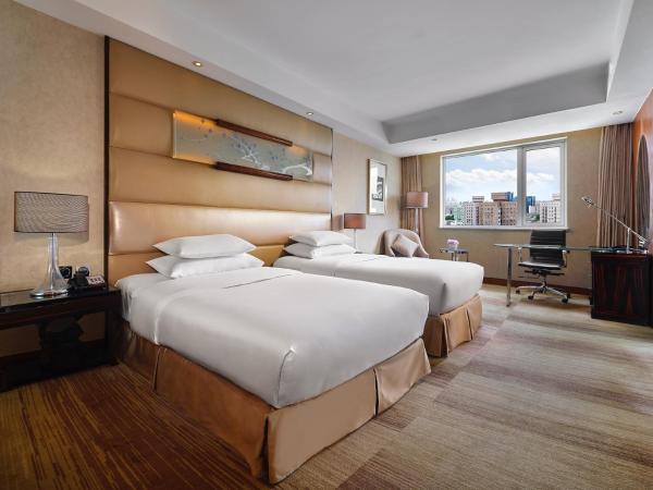 Gehua New Century Hotel Beijing : photo 1 de la chambre chambre lits jumeaux exécutive avec vue sur ville