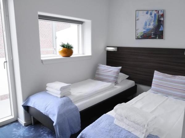 ApartHotel Faber : photo 8 de la chambre chambre lits jumeaux avec balcon