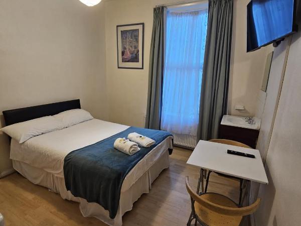 Bruce Rooms : photo 6 de la chambre chambre double - vue sur jardin