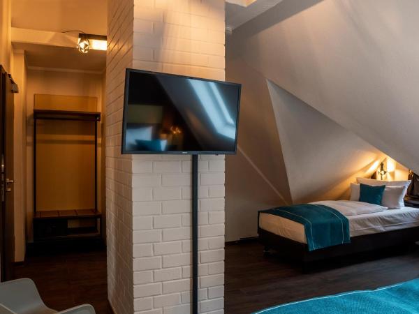 Trip Inn Hotel Sachsenhausen : photo 9 de la chambre chambre triple