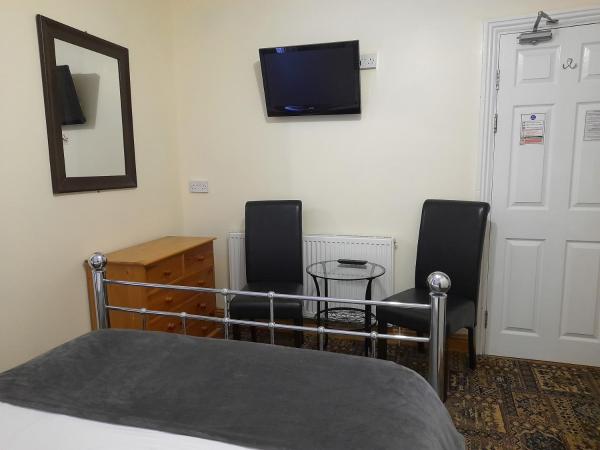 Phoenix Guest House : photo 6 de la chambre grande chambre double