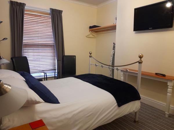 Phoenix Guest House : photo 5 de la chambre grande chambre double