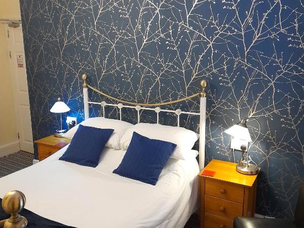 Phoenix Guest House : photo 3 de la chambre grande chambre double