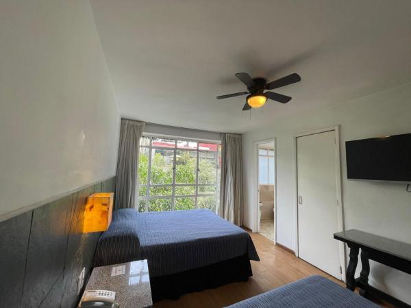 Suites Havre : photo 1 de la chambre appartement 1 chambre avec 2 lits doubles