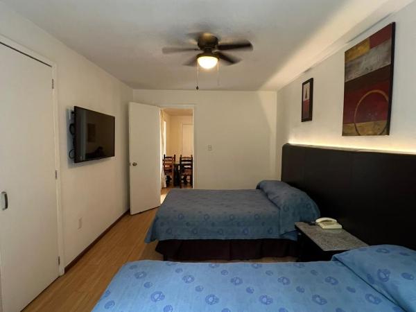 Suites Havre : photo 2 de la chambre appartement 1 chambre avec 2 lits doubles