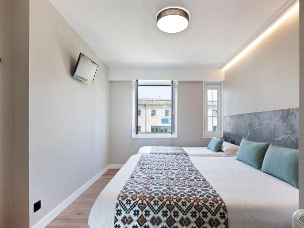 PR 25 de Julio : photo 4 de la chambre chambre double avec lit d'appoint