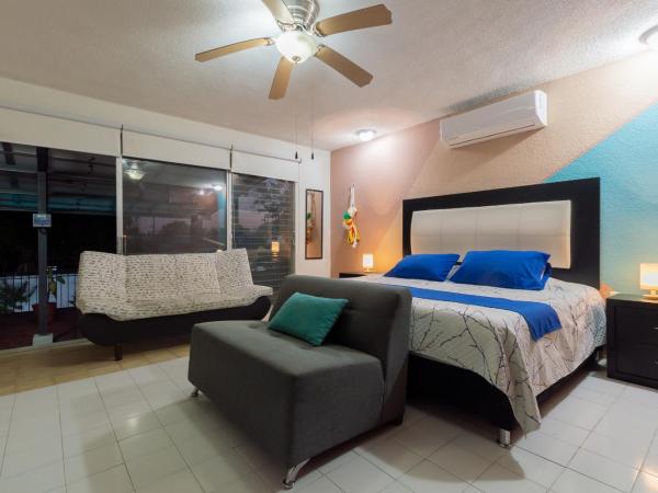 Jardín Mérida : photo 7 de la chambre chambre triple avec balcon