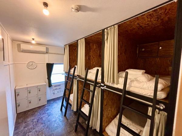 Guesthouse KOBE YAMATOMUSUBI : photo 1 de la chambre lit superposé dans dortoir mixte