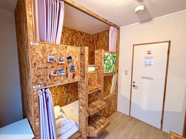 Guesthouse KOBE YAMATOMUSUBI : photo 4 de la chambre lit dans dortoir pour femmes de 4 lits
