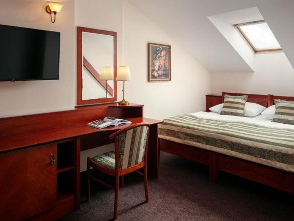 Amigo City Centre : photo 1 de la chambre appartement familial