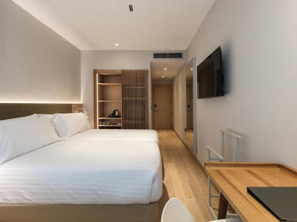 Zenit Coruña : photo 3 de la chambre chambre lits jumeaux avec lit d'appoint (3 adultes)